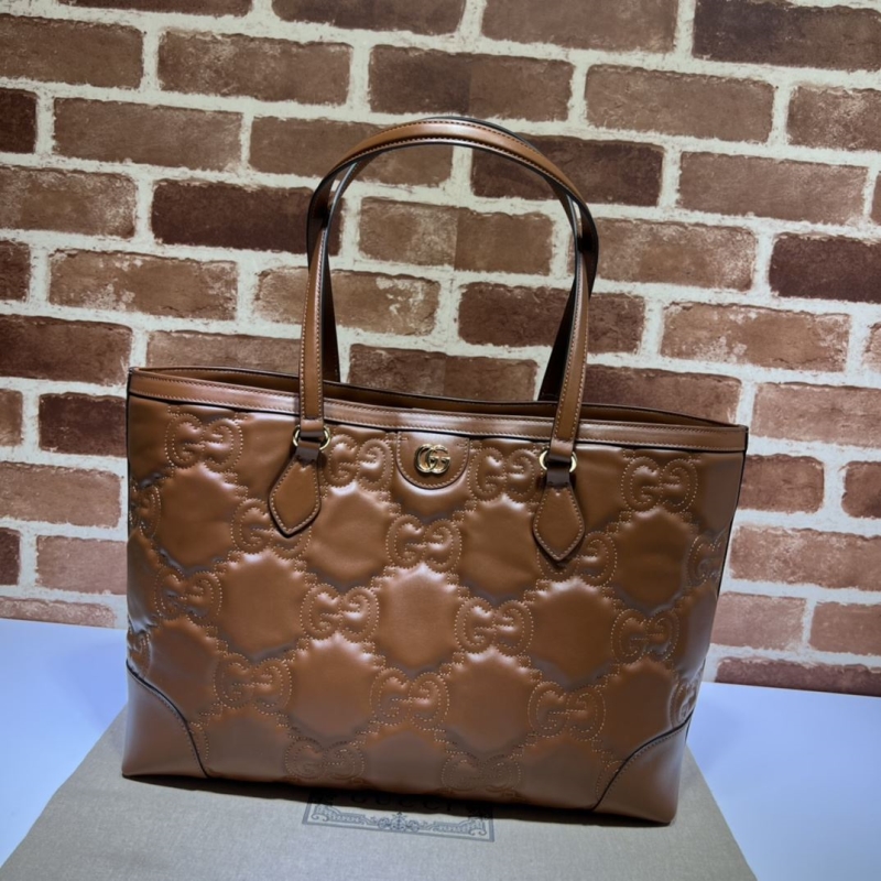 G*u*i shopping bags